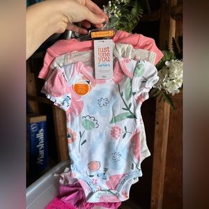 Pack of baby onesies